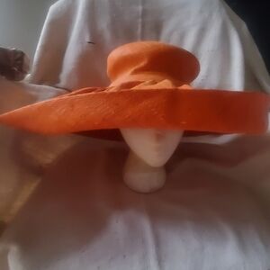 Lovely flexible orange rattan hat